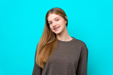 Obraz premium Teenager Russian girl isolated on blue background