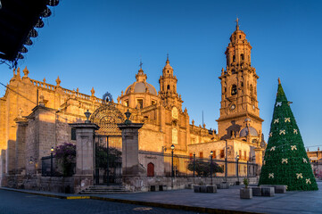 Fototapeta na wymiar Morelia Cathedral with bright morning sunshire in the city of Morelia, Michoacan, Mexico.