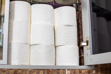 A locker full of toilet paper. A huge pile of toilet paper. A stockpile toilet paper