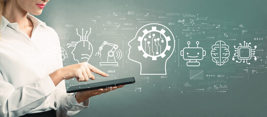 Future technology concept with business woman using a tablet computer
