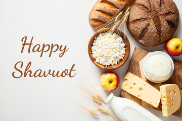 Jewish holiday Shavuot background with dairy products, cottage cheese, bottle of milk, wheat,...