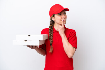 pizza delivery woman with work uniform picking up pizza boxes isolated on white background having...