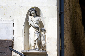 Naklejka premium Statue of Saint John the Baptist, Montrésor, France