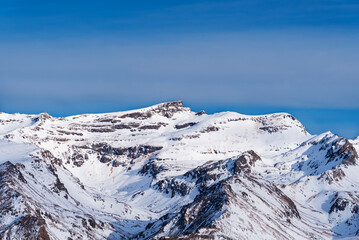 Fototapeta na wymiar View from the south of the top of Veleta in Sierra Nevada, all covered by a blanket of snow.