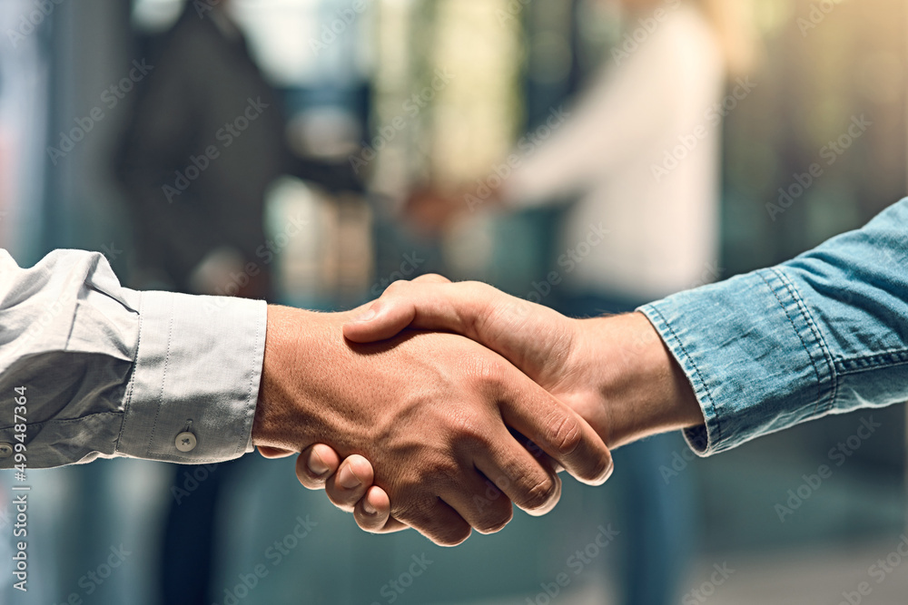 Poster you have to give respect to get it. shot of two unidentifiable young business partners shaking hands