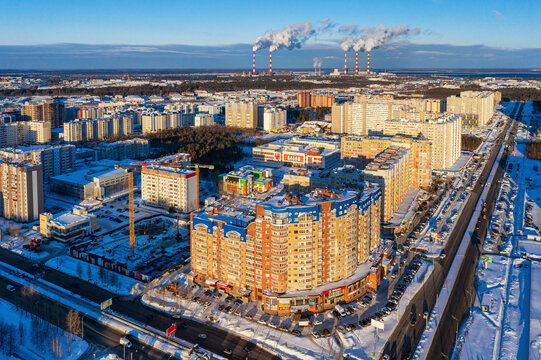 Surgut city in winter. Residential area, city development. Aerial view.