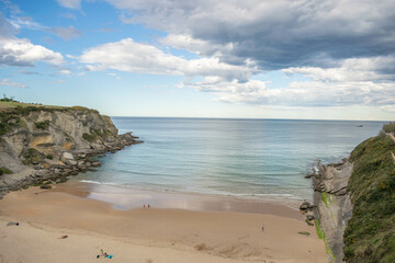 Fototapeta na wymiar Beach with clouds in Santander