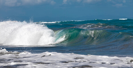 Fototapeta premium Ocean Wave Closeup Water. Ocean wave closeup detail of upright crashing hollow breaking water. energy power of nature.