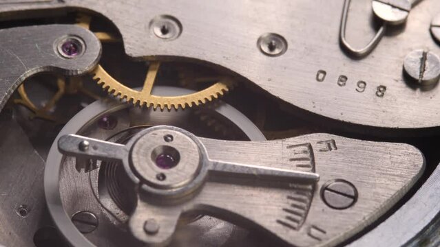 Detail of clockwork with gear. Old clock mechanism works. Successful business or teamwork concept. Watch gears detail