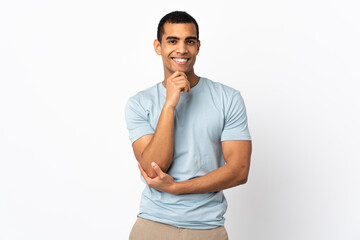 Fototapeta premium African American man over isolated white background laughing