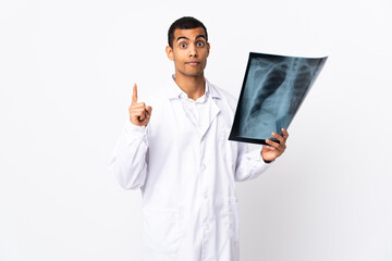 African American traumatologist over isolated whitebackground pointing with the index finger a great idea