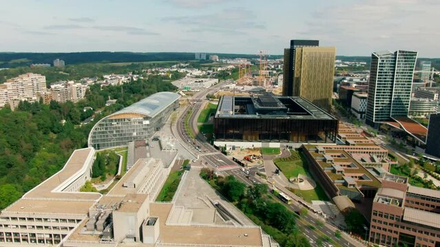 Aerial view of Court of Justice of European Union in Kirchberg quarter of Luxembourg City, Capital of EU. Urban Skyline of Downtown. Judicial institutions. 4K drone panoramic establishing shot