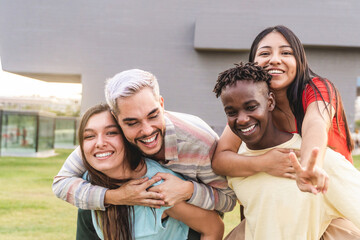 Diverse young people having fun together outdoor - Diversity lifestyle concept - Focus on gay man...