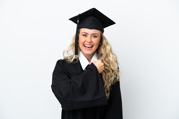 Young university graduate woman isolated on white background celebrating a victory