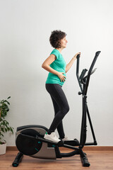 Pregnant woman exercising at home