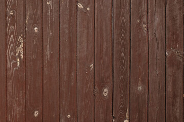 Naklejka premium Natural Brown Wooden Background. Wooden rustic background. Old boards. Copy space for your text or image. Top view. Dark brown wood boards. Blank for design and require a wood grain. Vertical.