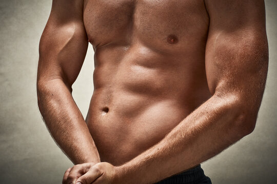 Game changing muscles. Cropped studio shot of a muscular man flexing his muscles.