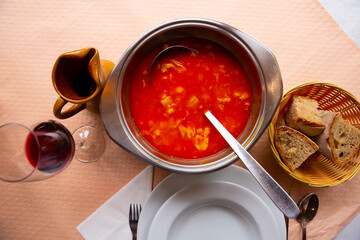 National Spanish dish Callos a la Gallega - thick broth with stewed tripe, vegetables and chilli pepper