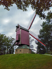 Naklejka premium The Lost Corner, originally De Verloren Hoek, a quarter in Bruges with historical windmills, Belgium