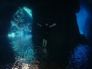  cave dive underwater exploring blue caves ocean scenery scuba divers to explore