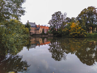 Fototapeta na wymiar Bruges town reflected in Lake of Love, Belgium