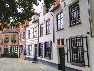 Fototapeta na wymiar Beautiful historical brick houses of Bruges town, Belgium 
