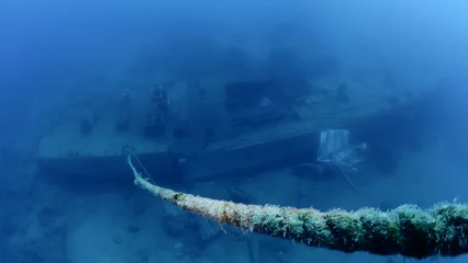    ship wreck underwater deep sea bottom metal on ocean floor scuba divers to explore © underocean