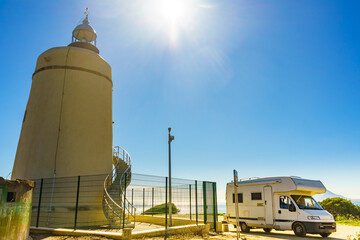 Caravan on spanish coast near lighthouse Carbonera