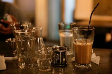glass of ice coffee latte on table