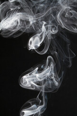 abstract real white smoke swirls black background