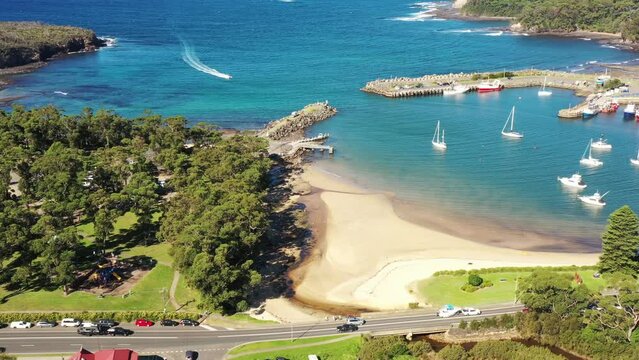 Ulladulla town residential suburbs on Sapphire coast of Pacific &ndash; aerial 4k.
