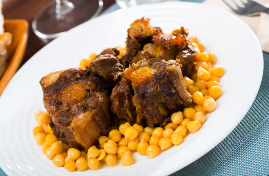 Oxtail stew with chickpeas - traditional Spanish dish. High quality photo
