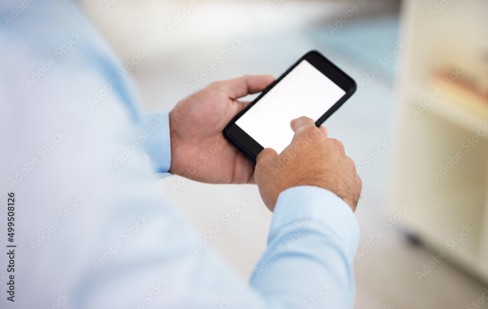 Aufkleber Get back to me when you can. Shot of a businessman using his smartphone to send a text message.
