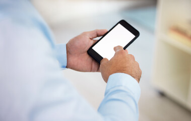 Get back to me when you can. Shot of a businessman using his smartphone to send a text message.