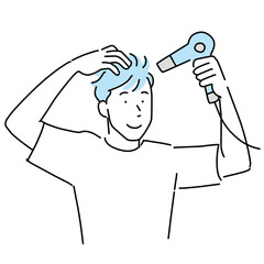 ドライヤーで髪をセットする男性