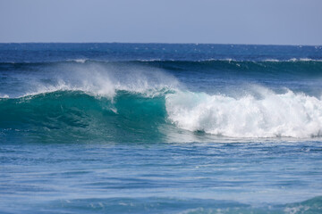 Waves crashing along Sunset Beach on Oahu