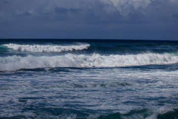 Waves crashing along Sunset Beach on Oahu