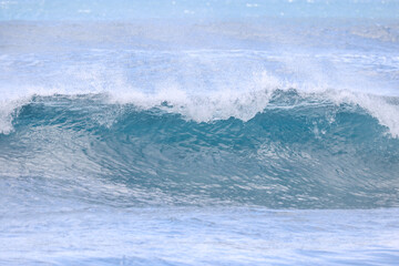 Naklejka na ściany i meble Waves crashing along Sunset Beach on Oahu