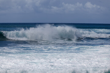 Waves crashing along Sunset Beach on Oahu