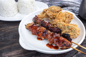 Popular filipino food pork barbeque and fried chicken