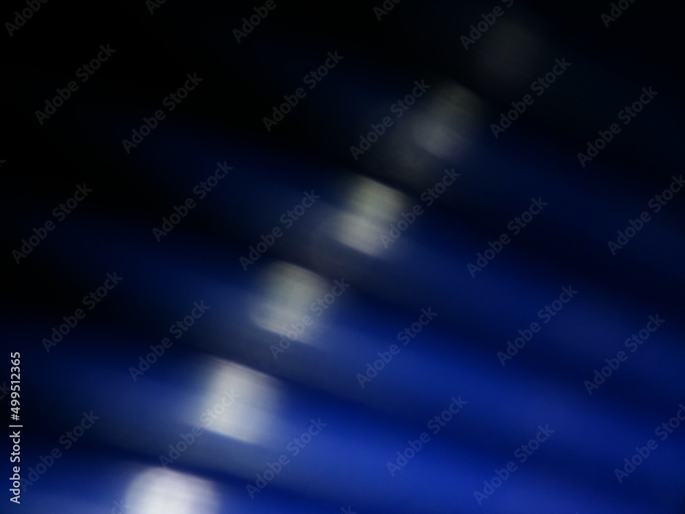 Wall mural conceptual blue blur with shiny particles texture with different elements. background with abstract 