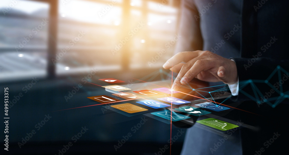 Poster businessman using tablet analyzing sales data and business growth on virtual interface. business str