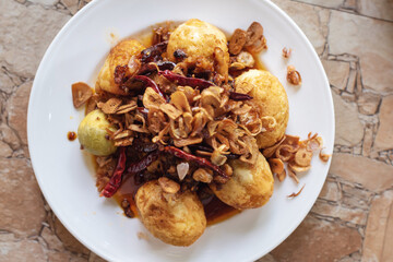 Boiled Eggs and bring to fried seasoned  in the plate for breakfast or lunch or diner
