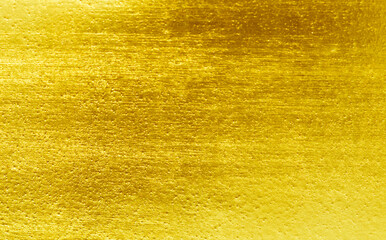 Naklejka premium Shiny yellow leaf gold foil texture