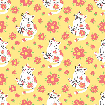 CUTE WHITE CAT WITH RED FLOWERS IN YELLOW BACKGROUND SEAMLESS PATTERN DESIGN.