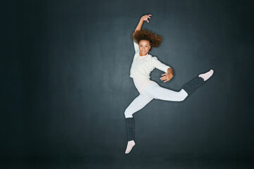 When youre dancing, youre moving. When youre moving, youre living. Studio shot of an attractive...