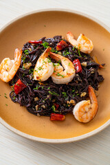 stir-fried black spaghetti with garlic and shrimps
