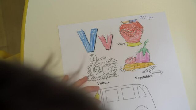 close up on a child coloring