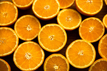 Overhead close up of oranges cut in half