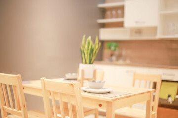 Fototapeta na wymiar Interior blur kitchen room for use background